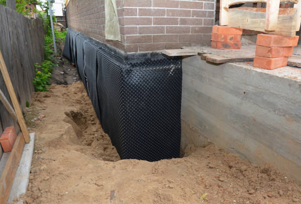 Happy homeowners after waterproofing job in Kennesaw